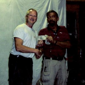World Famous Firearm Trainer, Writer & Shooter presents Al with his Autographed Dollar Bill for Trying his perfect score in Massad’s LFI Course