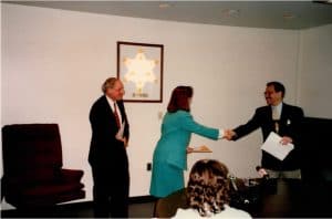 Mary receiving her ‘Crime Fighting Mom Award’ from (D) Wayne Co. Sheriff Robert Ficano {shaking Mary’s hand on her right} and (D) US Senator Carl Levin to her left.