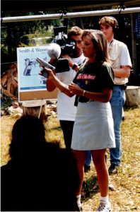 Mary being filmed for an international Broadcast for a Ted Nugent Outdoor Special while she demonstrates gun safety with television crew in background: 1997