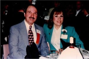 Mary with Macomb Co. Commissioner Sal Rocca after she wins the Macomb County Volunteer of the Year award