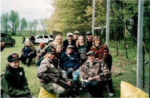 Ted Nugent with Family & Friends: 1st row left to right sitting, Ted, Scott Johnson, Christina Polkowski; 2nd row standing: Mary, Al & Jennifer Polkowski, Shemane Nugent: At Shemane’s ‘Queen of the Forest’ Women’s Program, at Ted’s Ranch in Jackson, MI